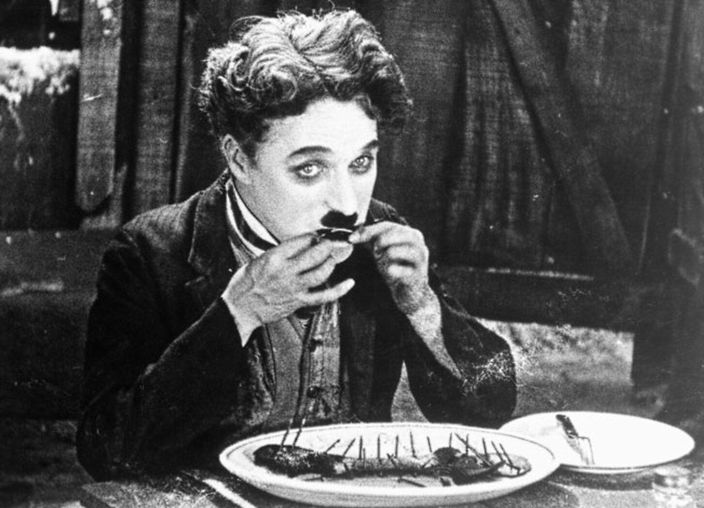 Charlie Chaplin eating